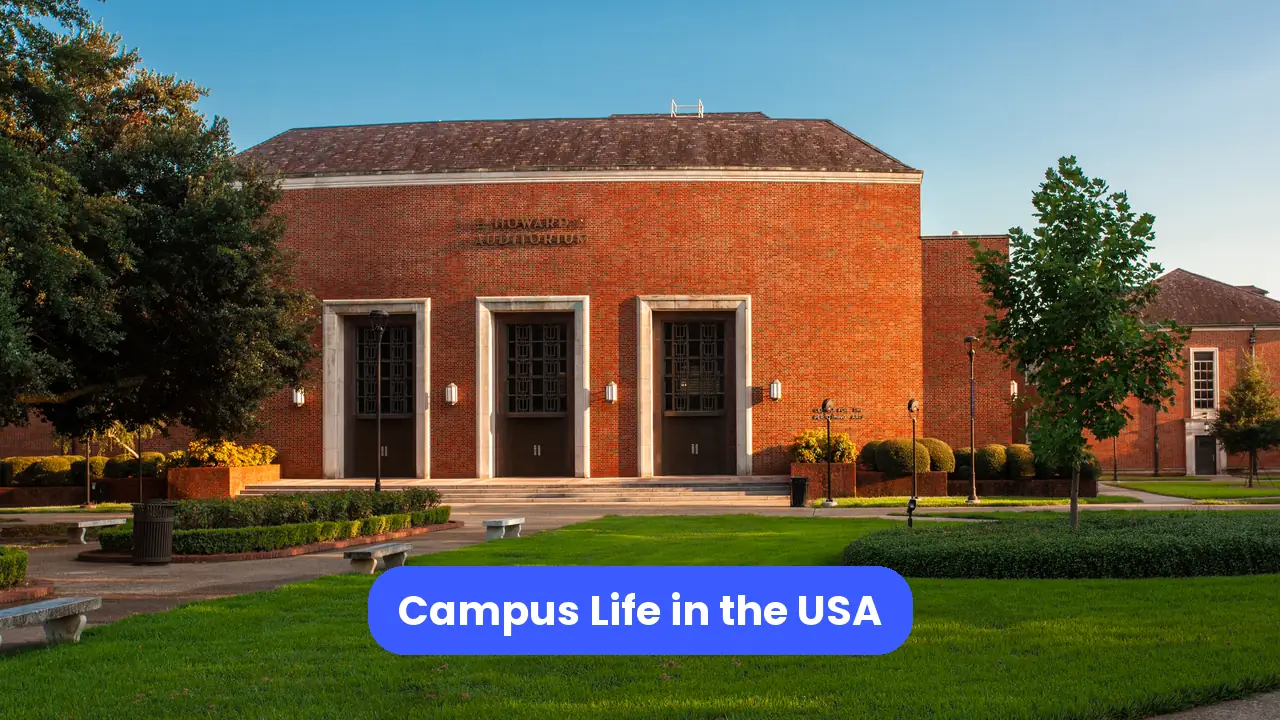 Photo of a university auditorium viewed from the quad, with a blue title banner.