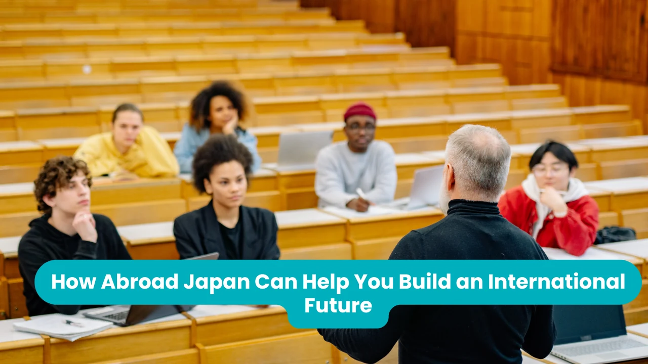 Studying abroad in Japan: a lecturer addressing a small group of international students at wooden desks in a tiered lecture theatre