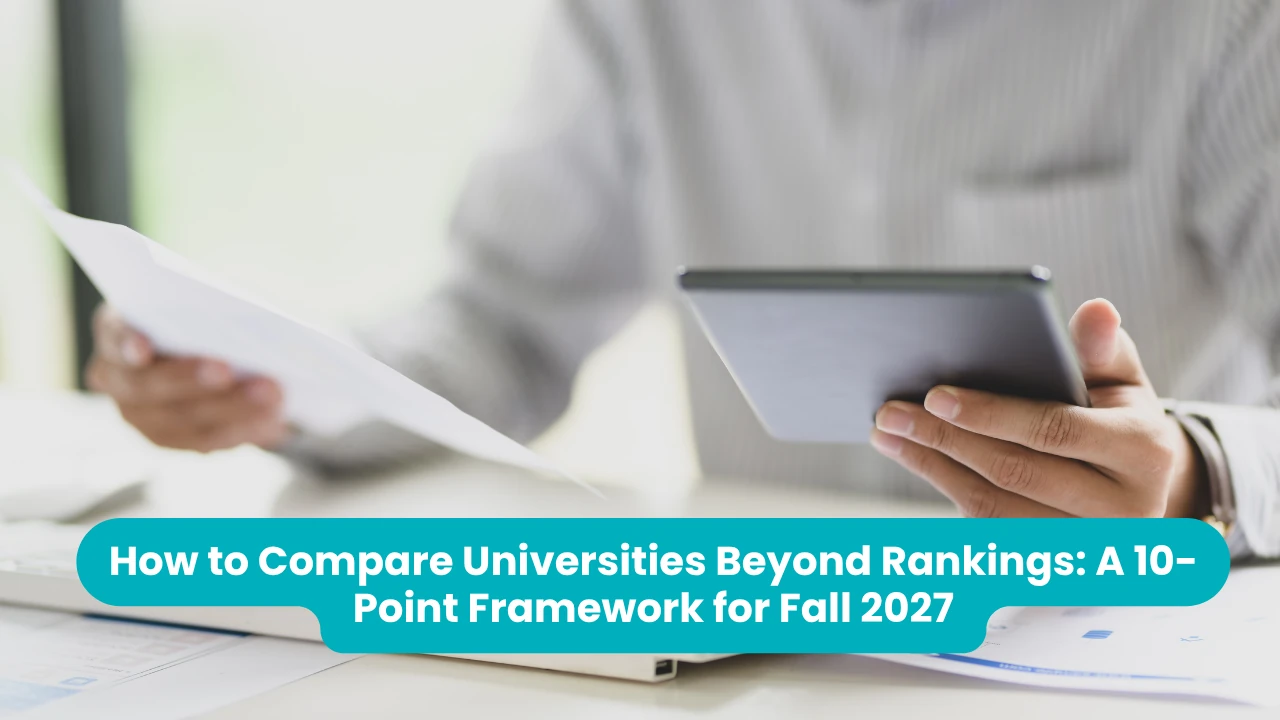 Banner reading 'How to Compare Universities Beyond Rankings: A 10-Point Framework for Fall 2027' across a photograph of a person in a grey striped shirt holding a printed sheet in one hand and a tablet in the other above a desk of documents