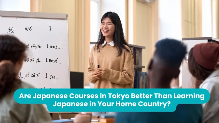 Are Japanese Courses in Tokyo Better Than Learning Japanese in Your Home Country? — a teacher smiling in front of a whiteboard in a bright classroom, with students seated around her