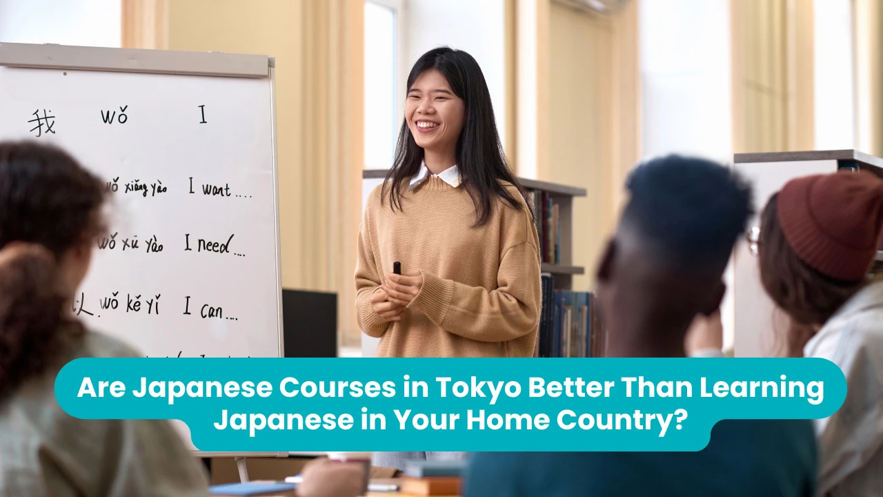 Are Japanese Courses in Tokyo Better Than Learning Japanese in Your Home Country? — a teacher smiling in front of a whiteboard in a bright classroom, with students seated around her