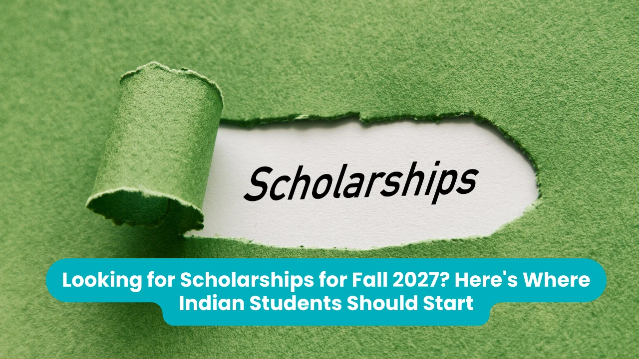Banner reading 'Looking for Scholarships for Fall 2027? Here's Where Indian Students Should Start' across a photograph of green paper torn open to reveal the handwritten word Scholarships on white beneath