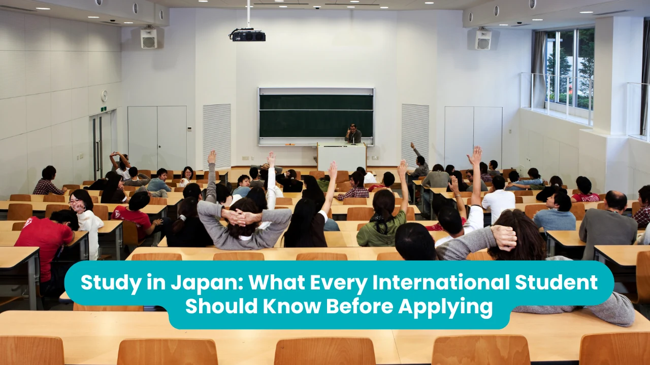 Study in Japan: students raising their hands to answer a question in a large university lecture hall