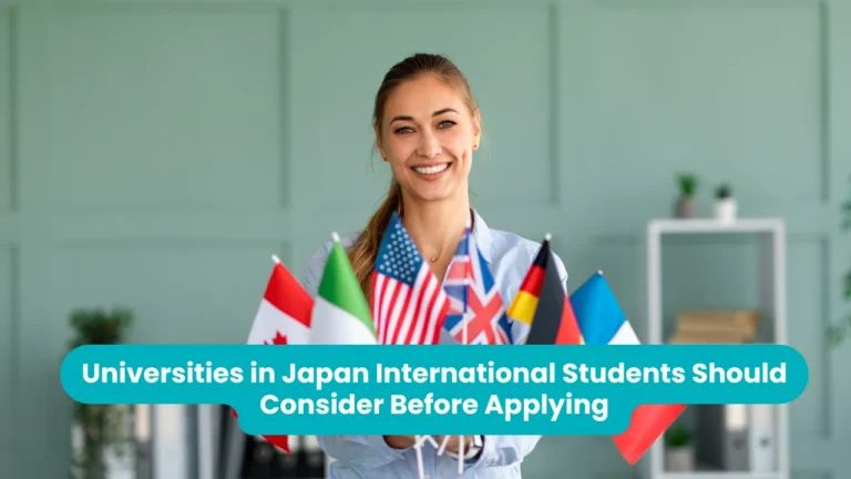 Universities in Japan International Students Should Consider Before Applying — a smiling woman in a pale blue shirt holding a fanned bunch of small national flags in front of her in a bright office