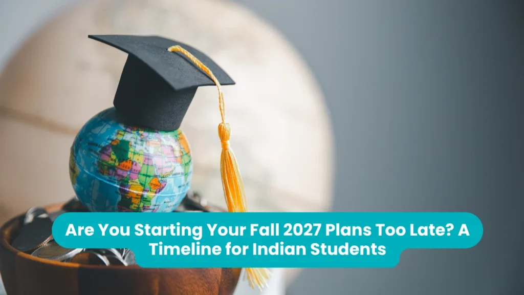 Banner reading 'Are You Starting Your Fall 2027 Plans Too Late? A Timeline for Indian Students' across a photograph of a black graduation cap with a gold tassel resting on a small coloured globe in a wooden stand, with a larger globe blurred behind it
