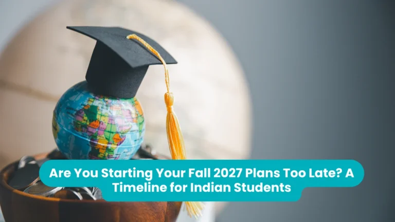 Banner reading 'Are You Starting Your Fall 2027 Plans Too Late? A Timeline for Indian Students' across a photograph of a black graduation cap with a gold tassel resting on a small coloured globe in a wooden stand, with a larger globe blurred behind it
